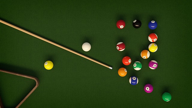 friends-playing-billiards-640x480-76924176.jpeg